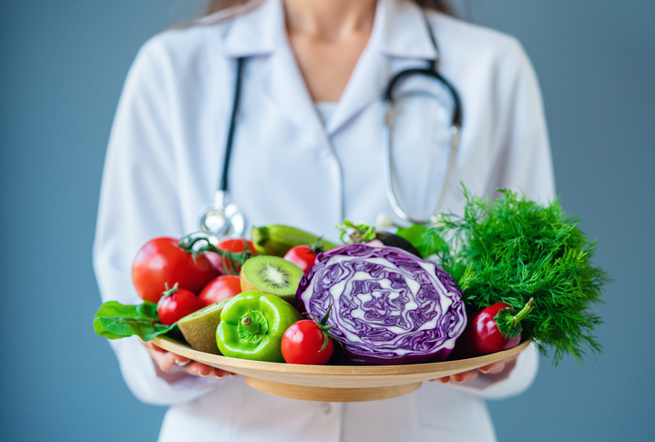 doctor holding fresh fruit in her hands(1)